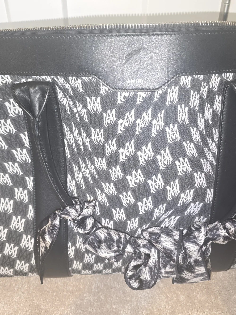 AMIRI Black & White Monogram Duffel Bag with Logo Pattern